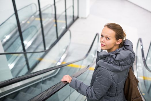 Young woman at a modern shopping center