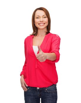 happy people concept - smiling woman showing thumbs up