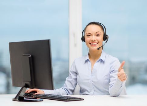 business, communication and call center concept - friendly female helpline operator with headphones showing thumbs up