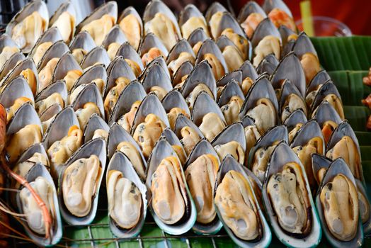 many fresh oyster on fire , food in Thailand