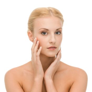 beauty and spa concept - face of beautiful woman touching her face skin