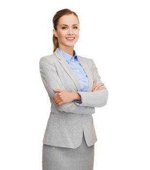 business, education and office concept - smiling businesswoman standing