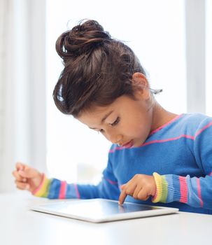 education, technology and internet concept - little girl with tablet pc