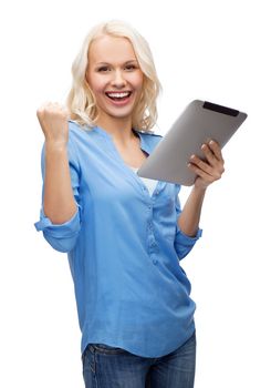 technology and internet concept - happy young woman with tablet pc computer