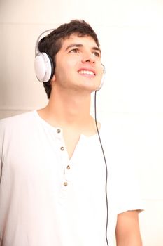 A young, latin man with a headphones
