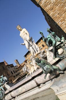 Statue on the Fountain of Neptune on the Piazza della Signoria in Florence, Italy, Europe.