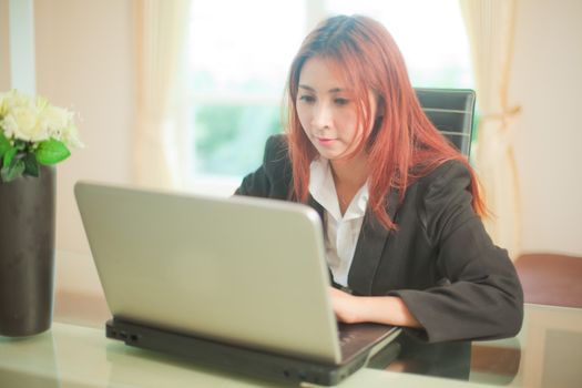 business asian young woman with laptop