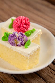 Flower Cake in white dish on the wood table