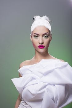 High fashion glamour model with white dress & hair