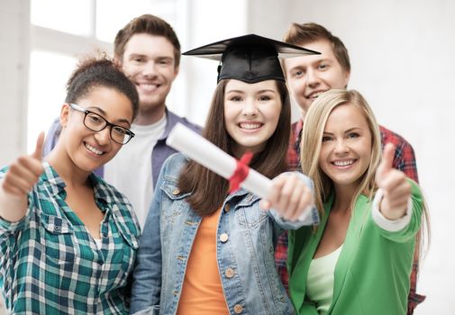 education concept - happy girl in graduation cap with diploma and students