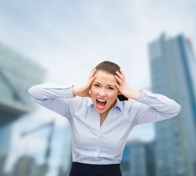 business, office and stress concept - angry screaming businesswoman outdoors