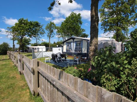 Campers in a beautiful camping site in the middle of nature