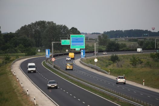 Highway with cars passing by