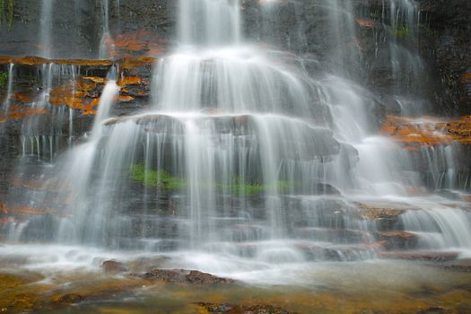 Waterfall coming down on the cliffs