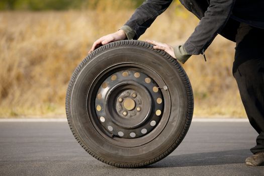 Wheel of a car on a road