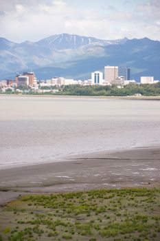 Sandy beach bay Anchorage Alaska downtown city skyline