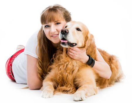 young woman with her ginger retriever isolated on a white background