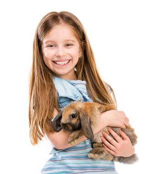 smiling little girl with Easter bunny isolated on a white background