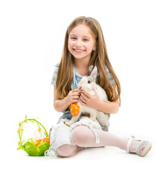 smiling little girl with Easter bunny on white