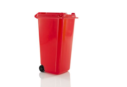 red garbage bin isolated on white