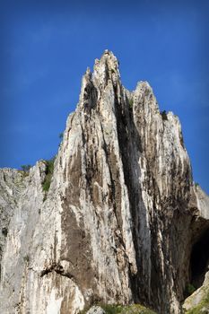 Beautiful limestone wild ridge in Turzii gorge, Romania. This interesting natural stone is called The Sharp Tower