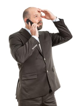 An image of a handsome business man at the phone