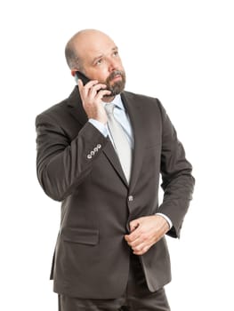 An image of a handsome business man at the phone