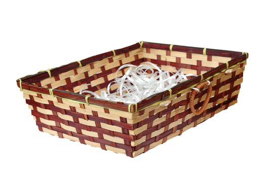 isolated wattle basket full of white plastic ribands