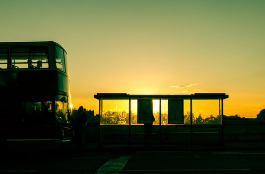 Bus stop at sunset in London, UK