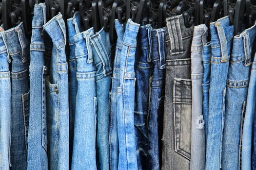 Row of hanged jeans