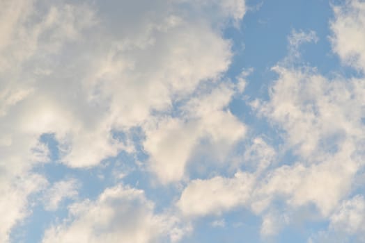 Blue sky with white clouds. Closeup photo