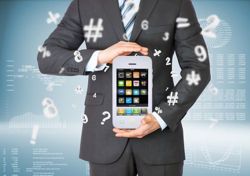 Businessman in suit holding big smart phone. Graphs and figures on background