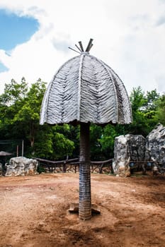 Artificial coconut tree, for giraffe lives in a zoo.