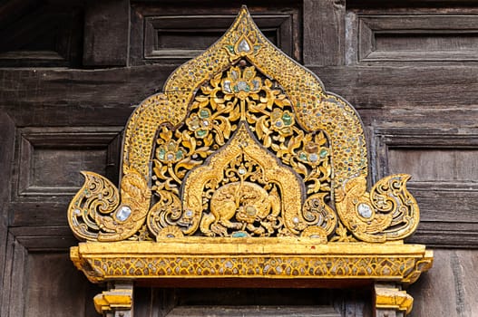 Wood carving decorated at Wat Phan-Tao temple in Chiang mai,Thailand