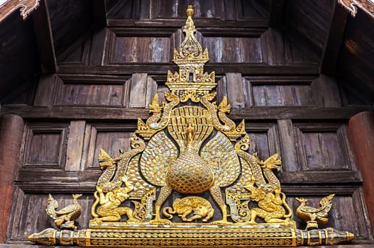 Wood carving decorated at Wat Phan-Tao temple in Chiang mai,Thailand