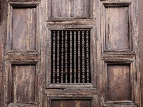 Wooden walls of the church at Wat Phan-Tao temple in Chiang mai,Thailand