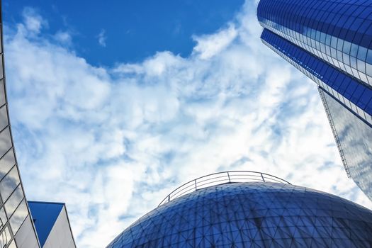 Office business building against the sky with clouds