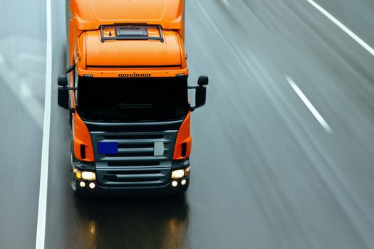Truck delivery cargo on the highway in motion