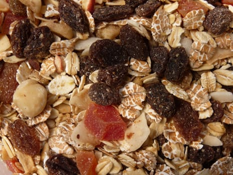 Dry Muesli With Fruits and Nuts Close Up Background