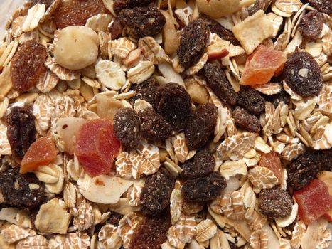 Dry Muesli With Fruits and Nuts Close Up Background
