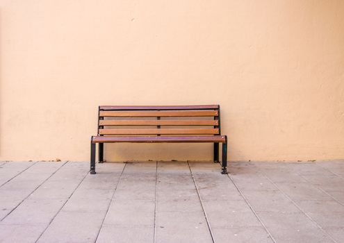 Chairs made ������of steel placed on an orange background.