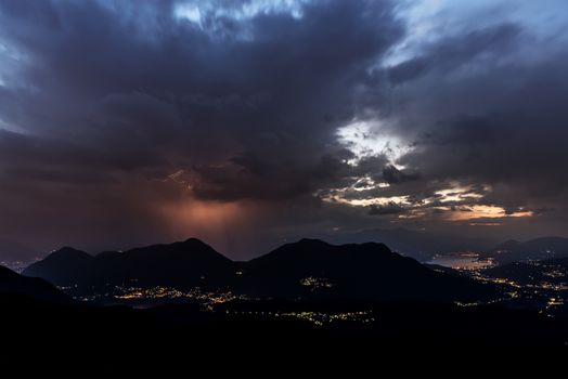 Rain and storm formation over the Maggiore Lake and mountains, Varese