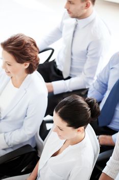 business concept - picture of smiling businessmen and businesswomen on conference