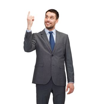 business, education and office concept - smiling businessman with finger up