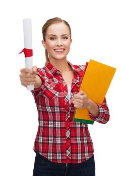 university and education concept - smiling woman with diploma and folders