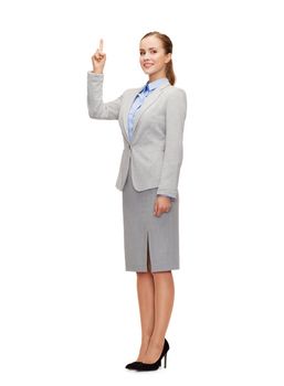 business and education concept - attractive young businesswoman with her finger up