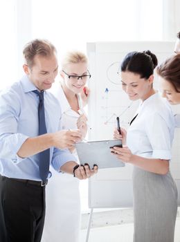 friendly business team having discussion in office