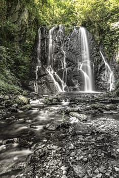 Waterfall Pevereggia in the forest, Switzerland