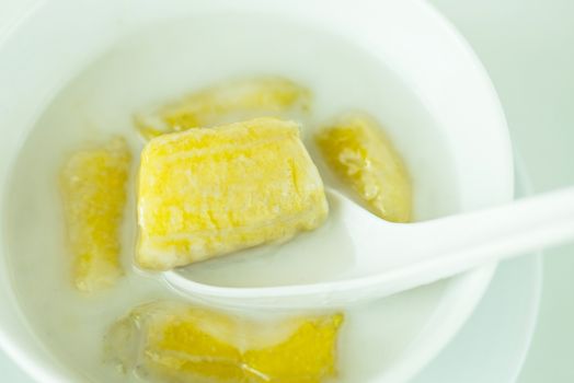 banana in coconut milk,Sweet yellow banana Topped with coconut milk is the famous dessert Thailand