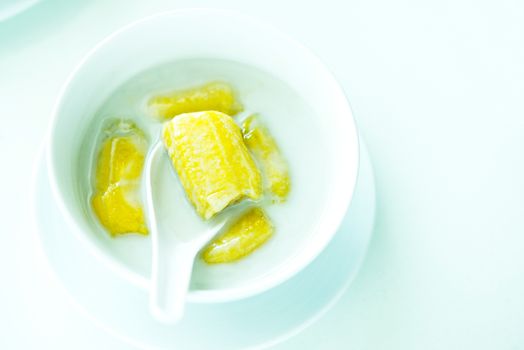 banana in coconut milk,Sweet yellow banana Topped with coconut milk is the famous dessert Thailand